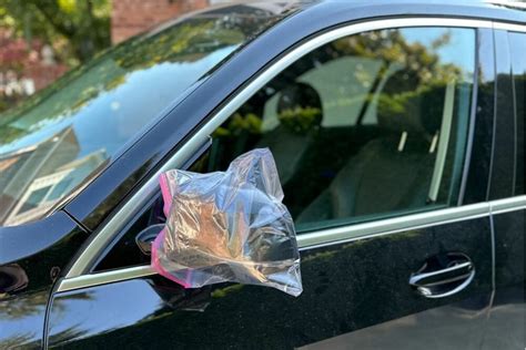 putting bags on mirrors when driving alone.